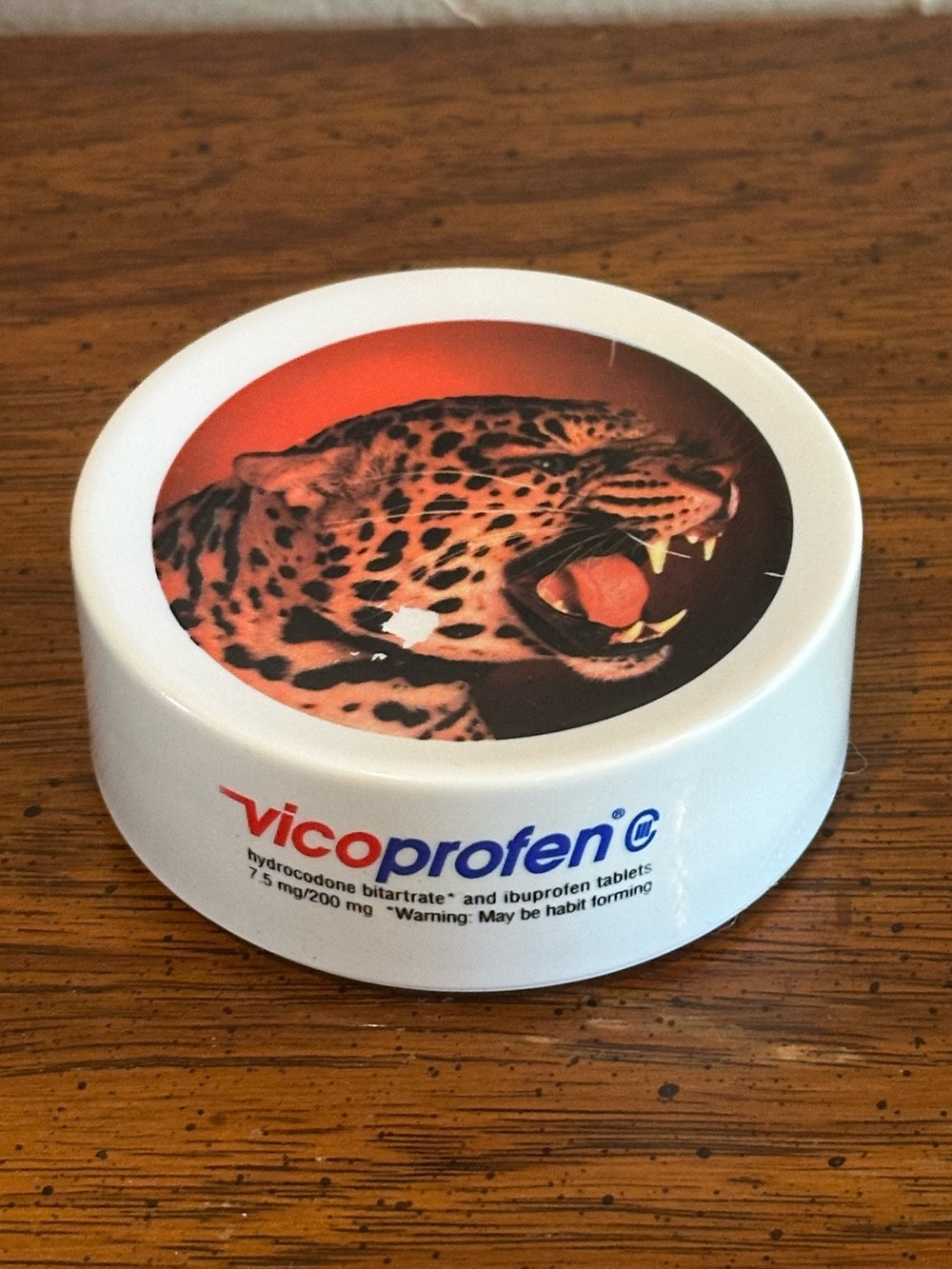 Vintage Vicoprofen Promotional Paperweight Change Puck featuring Jaguar Graphic